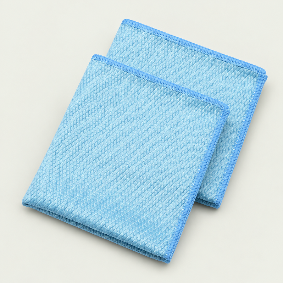 Two blue microfibre cloths with diamond weave and stitched edges