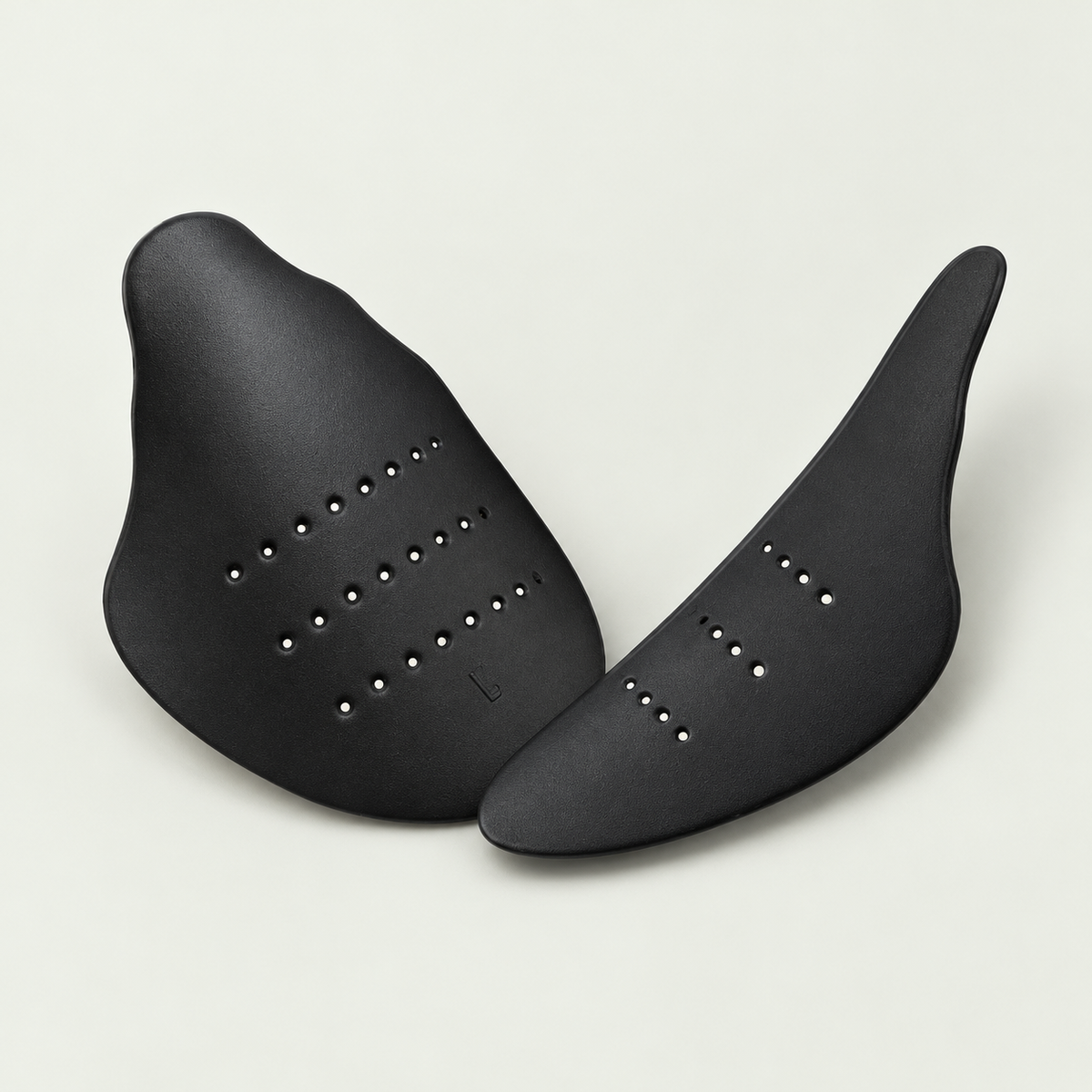 One pair of black ventilated trainer crease guard inserts