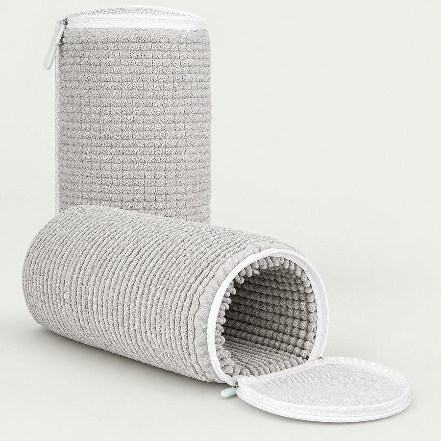 Two grey cylindrical trainer wash bags with white zip rims